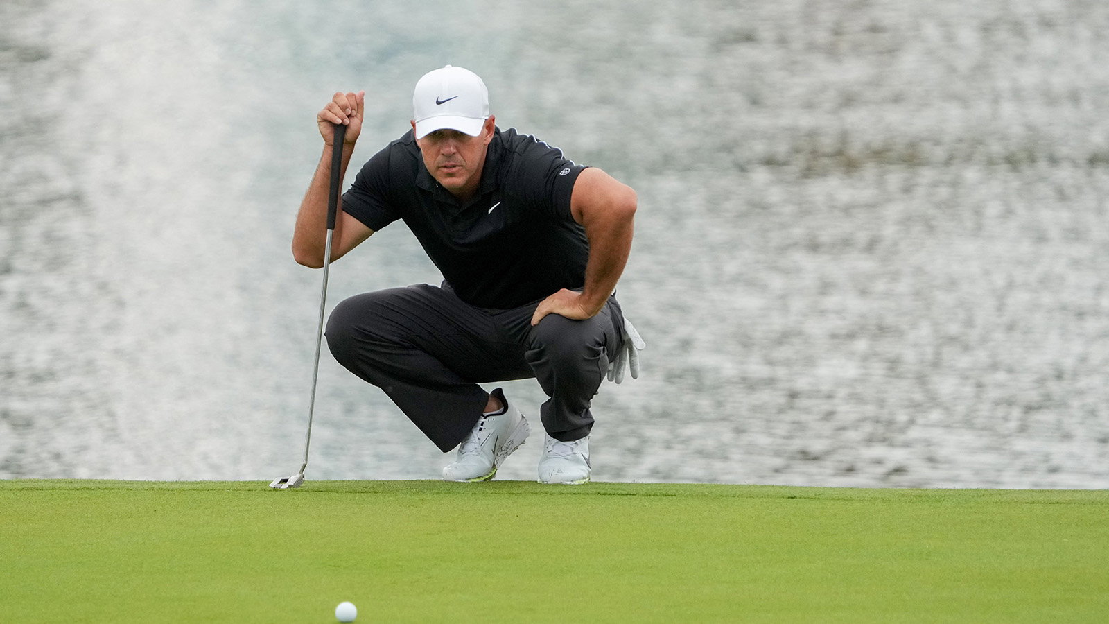 Brooks Koepka received treatment on his elbow during the third round of the RBC Canadian Open