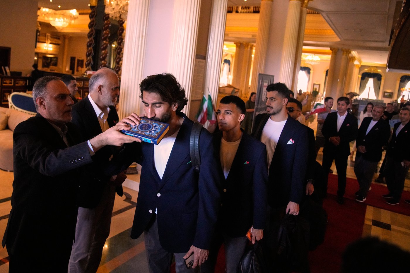 Iran's soccer team leaves for World Cup as some officials still await US visas