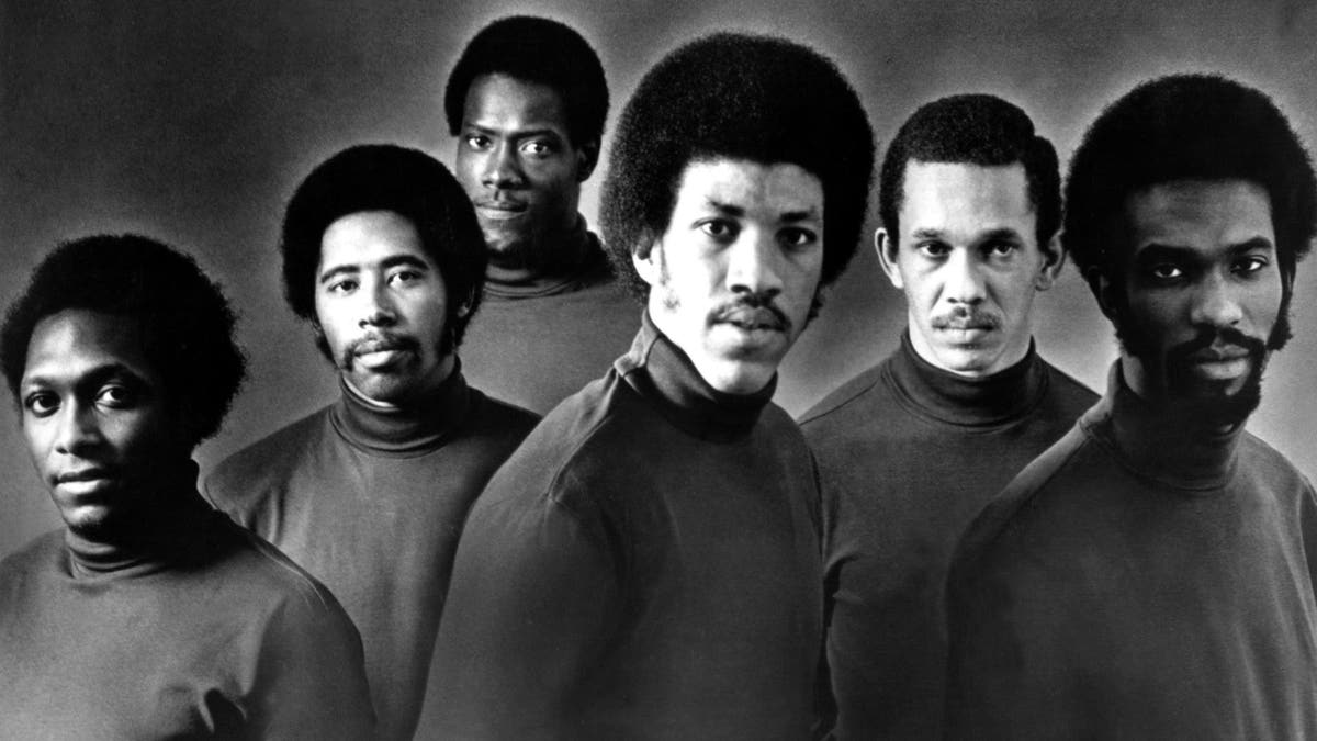 R&B group the Commodores posing for a portrait in the mid 1970s