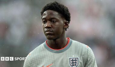 Kobbie Mainoo wearing an England training top