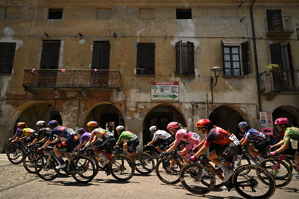SALUZZO, ITALY - JUNE 07: Anna van der Breggen of Netherlands and Team SD Worx - Protime - Pink Leader Jersey and a general view of the peloton competing during the 37th Giro d&amp;apos;Italia Women 2026 - Stage 9 a 145km stage from Saluzzo to Saluzzo / #UCIWWT / on June 07, 2026 in Saluzzo, Italy. (Photo by Luc Claessen/Getty Images)