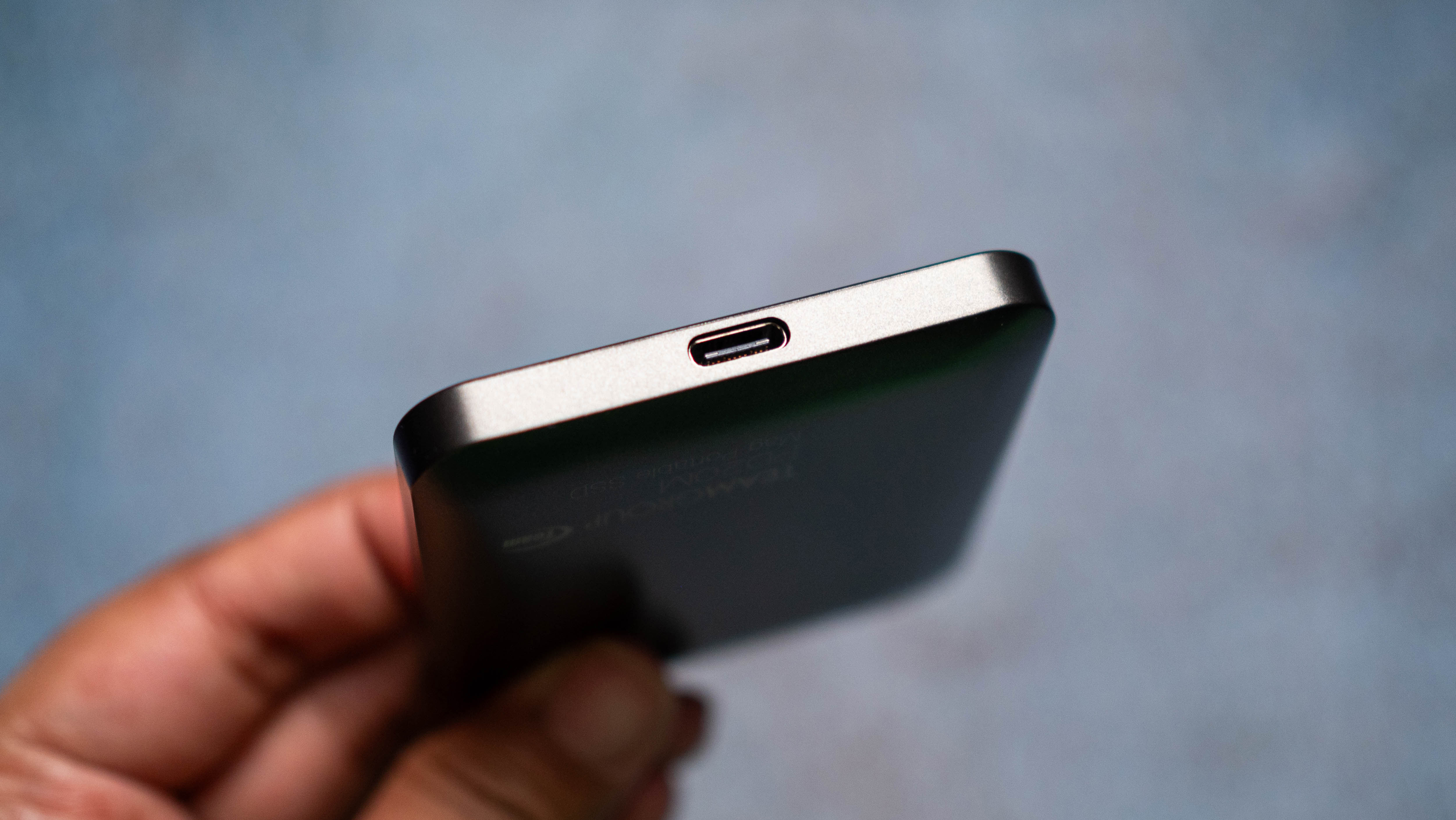 TeamGroup PD20M MagSafe SSD design photos against a craft sheet