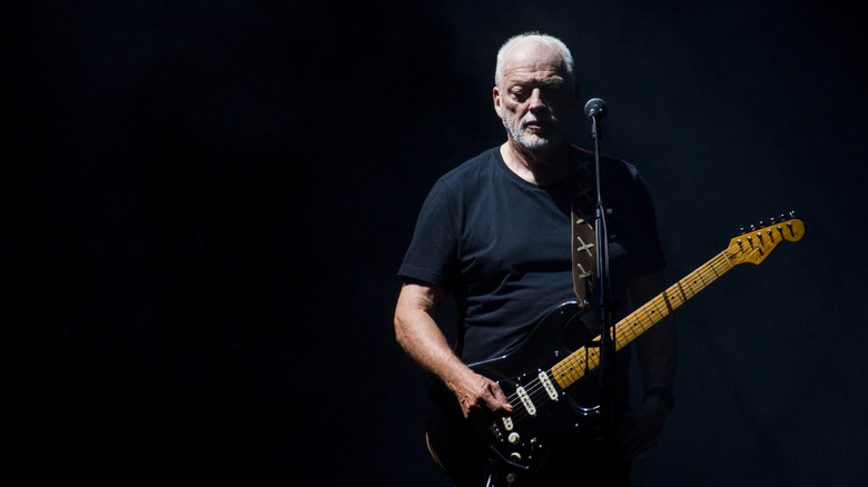 David Gilmour onstage with guitar