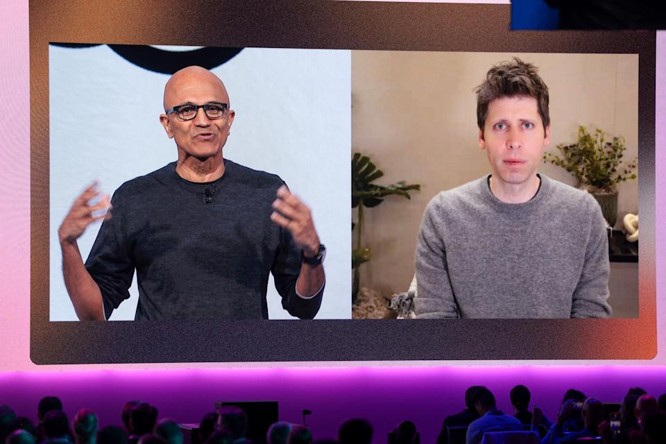 Microsoft chair and CEO Satya Nadella (L), speaks with OpenAI CEO Sam Altman, who joined by video, during the Microsoft Build 2025 conference in Seattle on May 19, 2025. (Jason Redmond/AFP via Getty Images)
