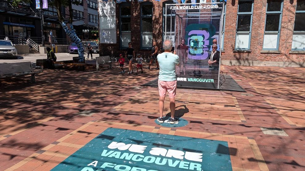 dear soccer fifa world cup logo art glass installation yaletown vancouver