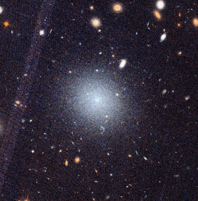 Third Galaxy Without Dark Matter Makes a Weird Cosmic Trail Harder to Ignore