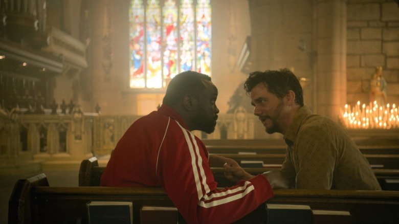 Ray and Manny sitting in a church and arguing on Dope Thief S1E4