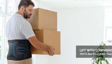 Worker lifting boxes while wearing a FEATOL lower back brace for lumbar support and lifting assistance.