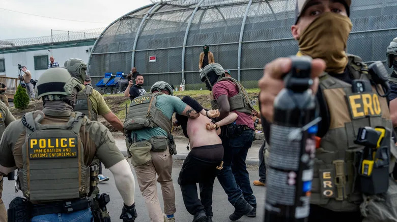 AY 26: Federal agents detain a protestor outside the federal immigration center at Delaney Hall in Newark, where ICE is housing detained immigrants on May 26, 2026 in Newark, New Jersey. The protests, which have become tense over the holiday weekend, come amid reports of an ongoing hunger strike by detainees.
