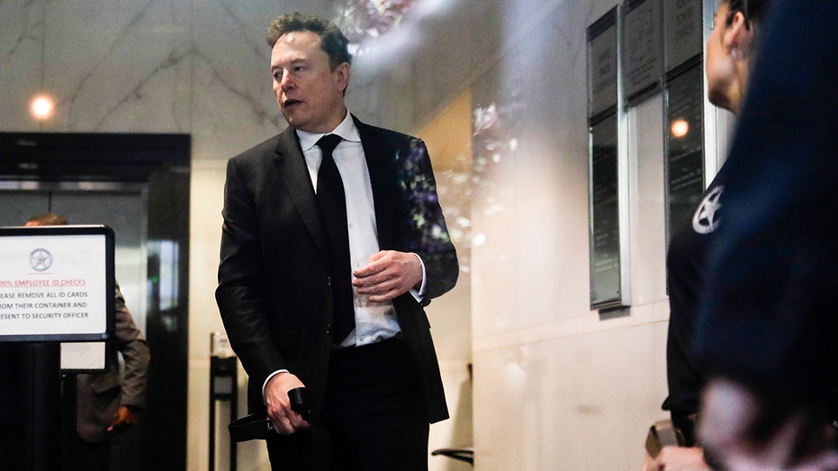Elon Musk arrives for the trial