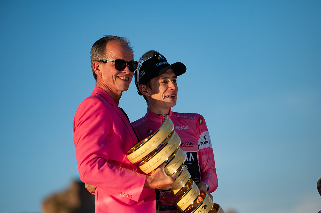 (L-R) Team Visma | Lease a Bike General Manager and CEO Richard Plugge and overall race winner Jonas Vingegaard of Denmark and Team Visma | Lease a Bike Pink Leader Jersey pose with the Trofeo Senza Fine during the podium ceremony after the 109th Giro d'Italia 2026, Stage 21, a 131km stage from Rome to Rome, on May 31, 2026, in Rome, Italy. (Photo by Massimo Valicchia/NurPhoto)