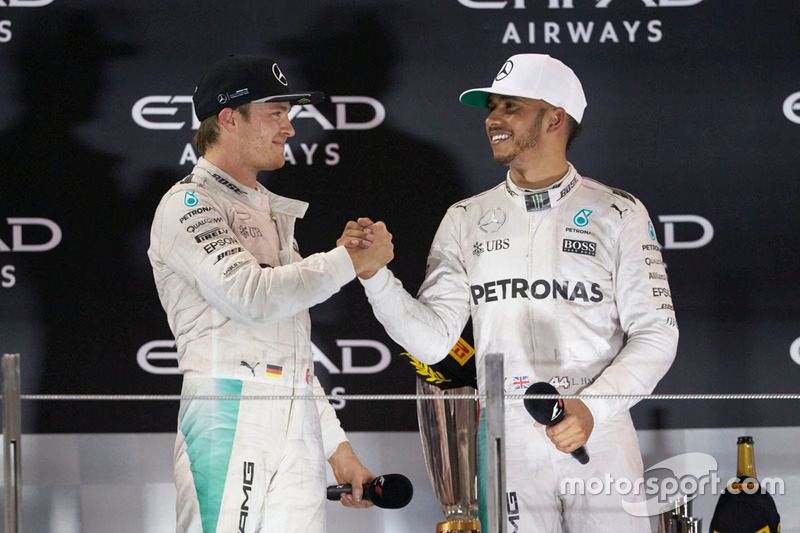 World Champion Nico Rosberg, Mercedes AMG F1 shakes hands with team mate and race winner Lewis Hamilton, Mercedes AMG F1