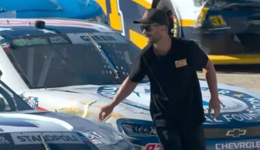 Fan arrested after scaling fences onto NASCAR track, fist-bumping driver during stoppage