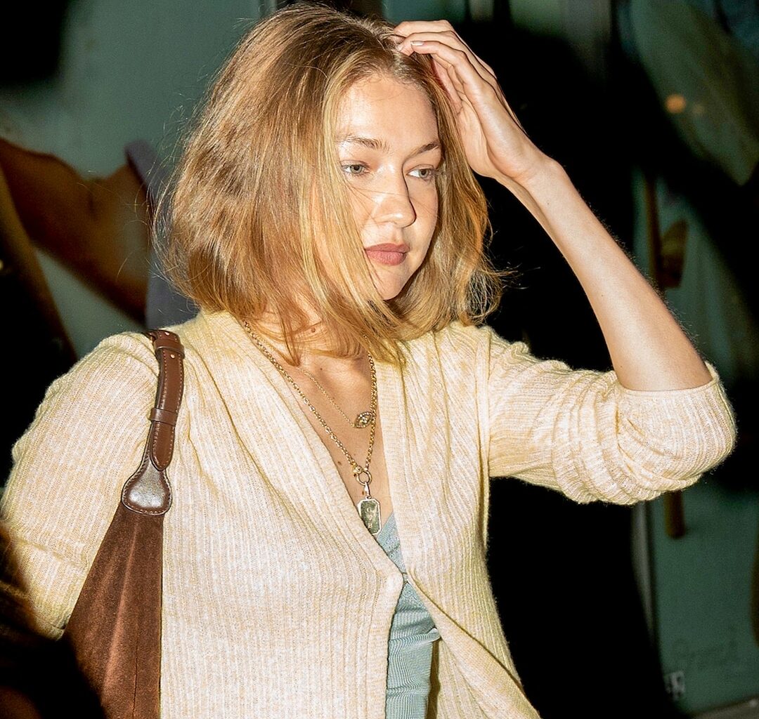 Gigi Hadid's Bradley Cooper Gold Dog Tag Necklace: Cost & More Details
