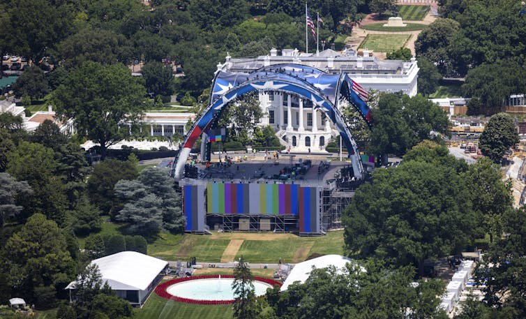 Construction of the UFC octagon continues in front of the White House.