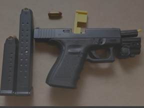 A firearm and ammunition seized by Durham Regional Police.