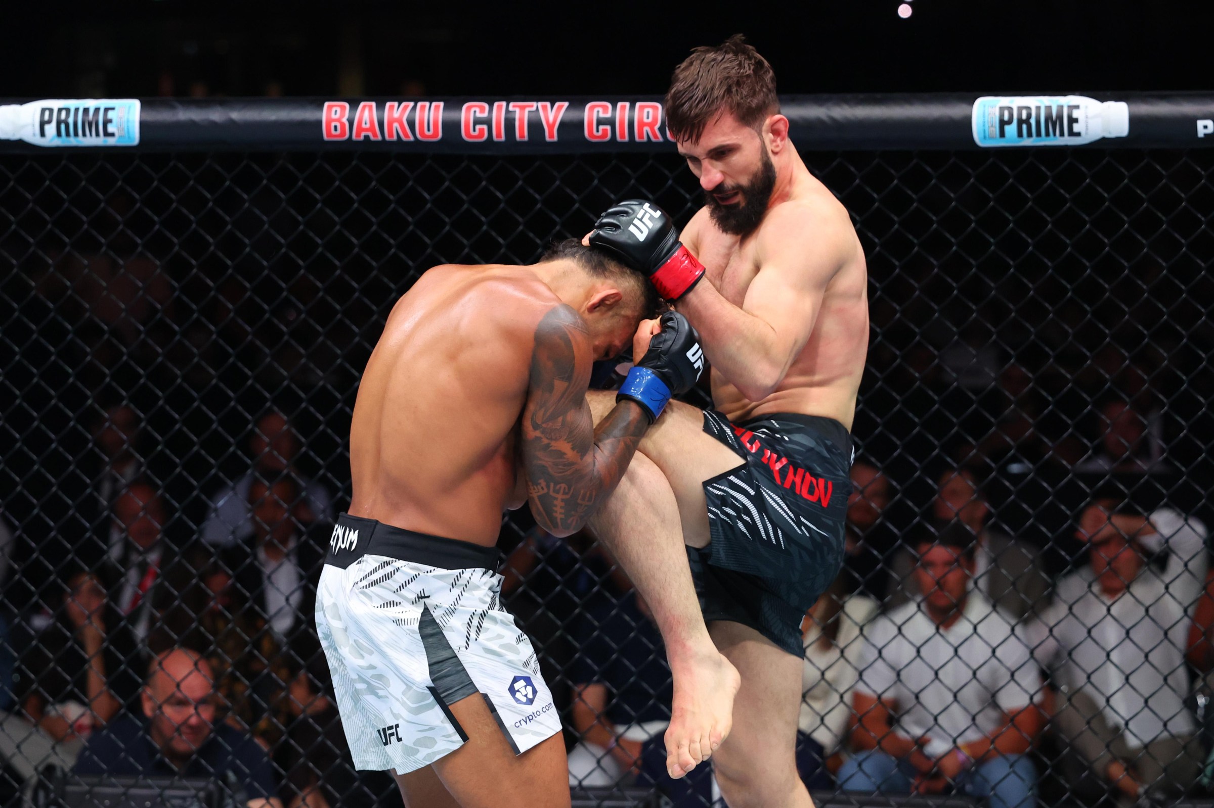 BAKU, AZERBAIJAN - JUNE 21: (R-L) Nazim Sadykhov of Russia knees Nikolas Motta of Brazil in their lightweight fight during the UFC Fight Night event at Baku Crystal Hall on June 21, 2025 in Baku, Azerbaijan. (Photo by Ed Mulholland/Zuffa LLC)