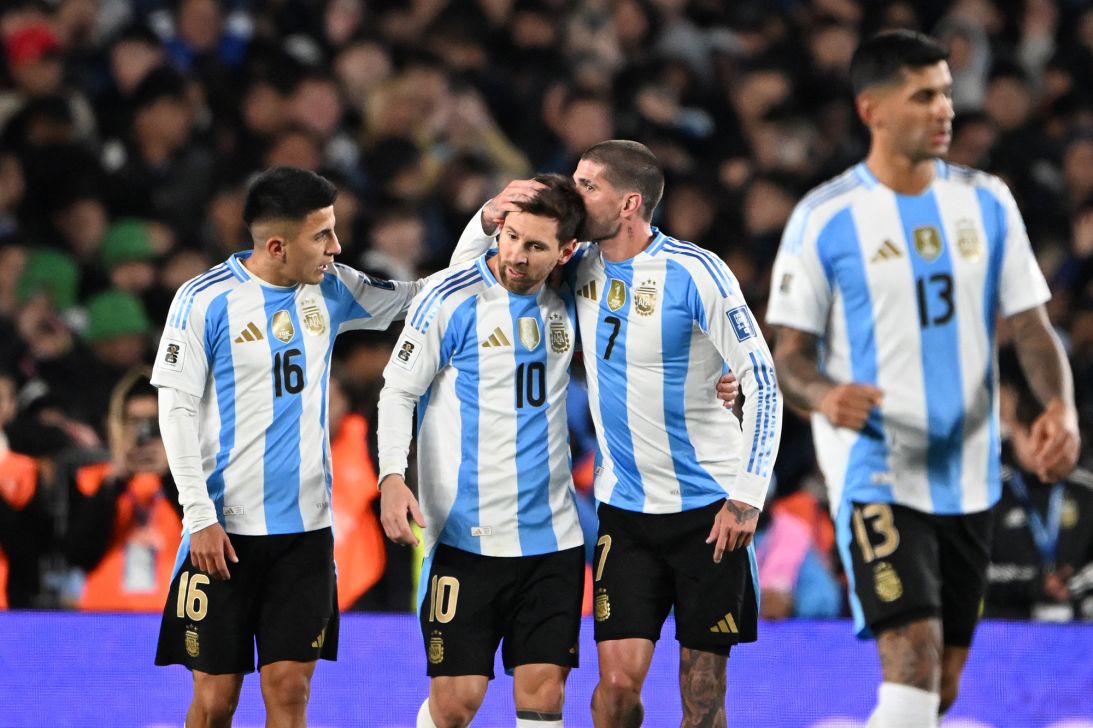 Argentina's forward #10 Lionel Messi, second left, celebrates with teammates after scoring his team's first goal during the 2026 FIFA World Cup South American qualifiers match between Argentina and Venezuela at the Mas Monumental stadium in Buenos Aires on September 4, 2025.