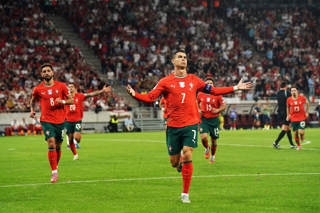 Cristiano Ronaldo of Portugal scores and celebrates during the FIFA World Cup 2026 qualifier match between Hungary and Portugal at Puskas Arena on September 9, 2025.