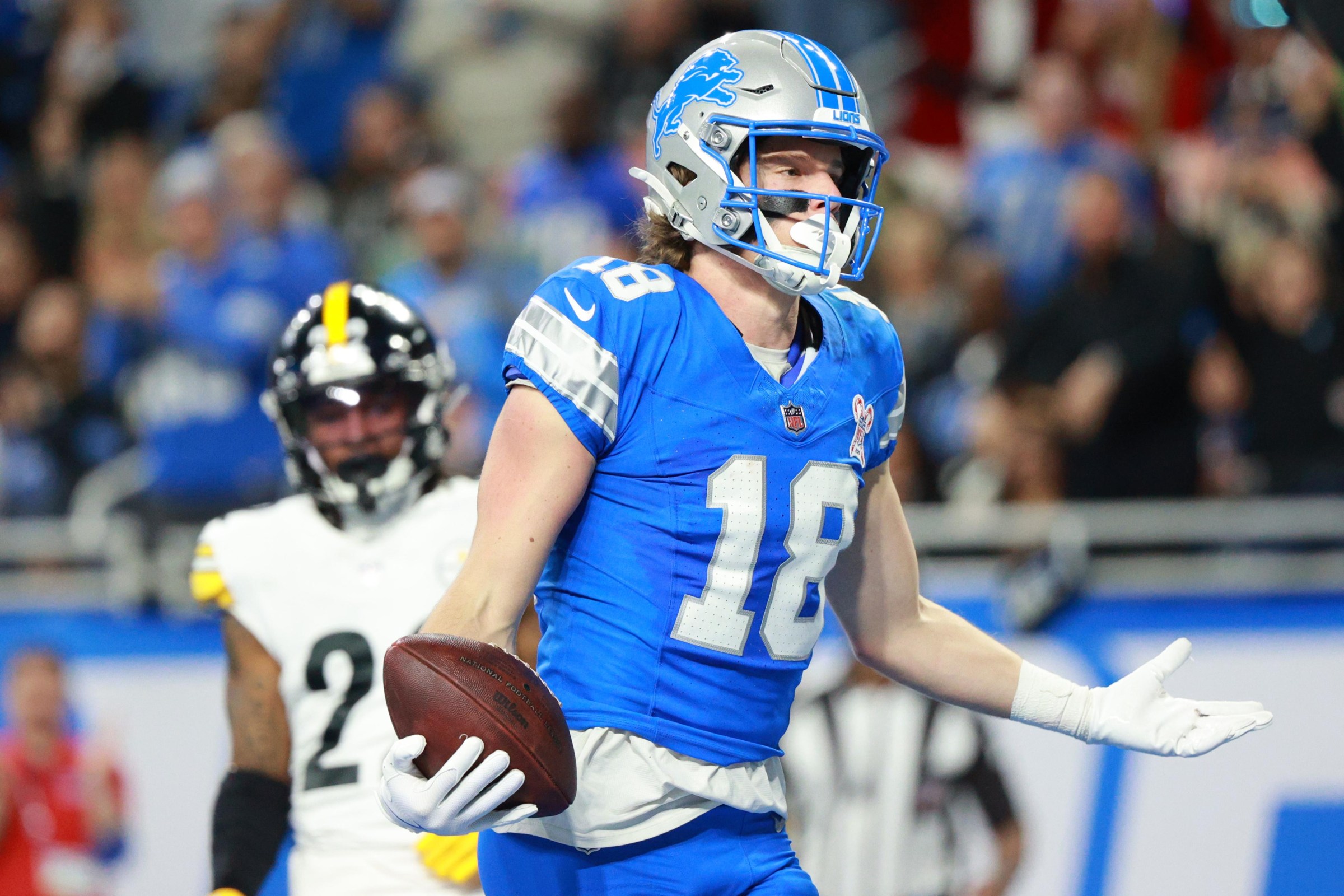 DETROIT,MICHIGAN-DECEMBER 21: Detroit Lions wide receiver Isaac Teslaa #18 reacts after his touchdown during the first half of an NFL football game between the Pittsburgh Steelers and the Detroit Lions in Detroit, Michigan USA, on Sunday, December 21, 2025 (Photo by Jorge Lemus/NurPhoto via Getty Images)