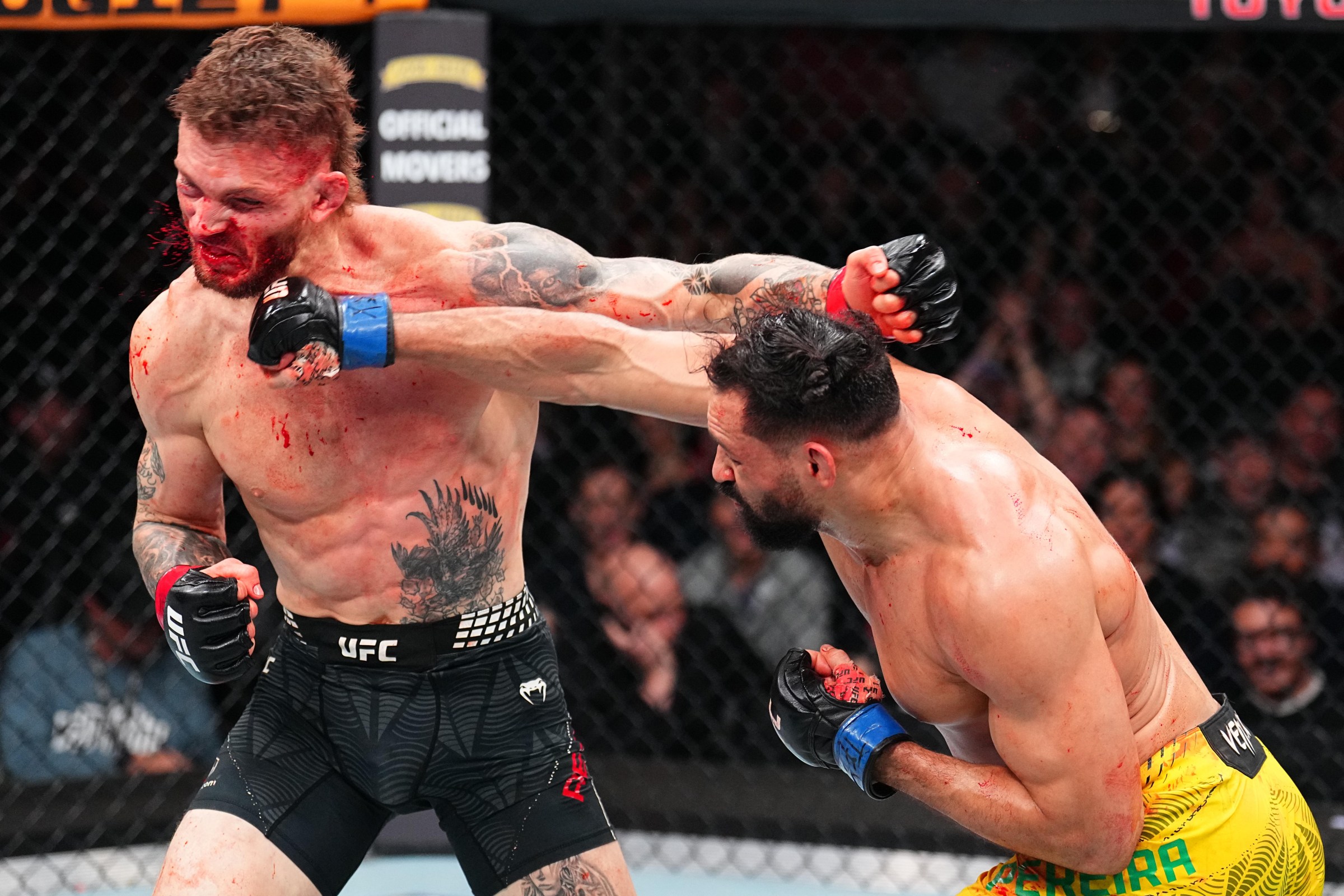 HOUSTON, TEXAS - FEBRUARY 21: (R-L) Michel Pereira of Brazil punches Zach Reese in a middleweight fight during the UFC Fight Night event at Toyota Center on February 21, 2026 in Houston, Texas. (Photo by Chris Unger/Zuffa LLC)