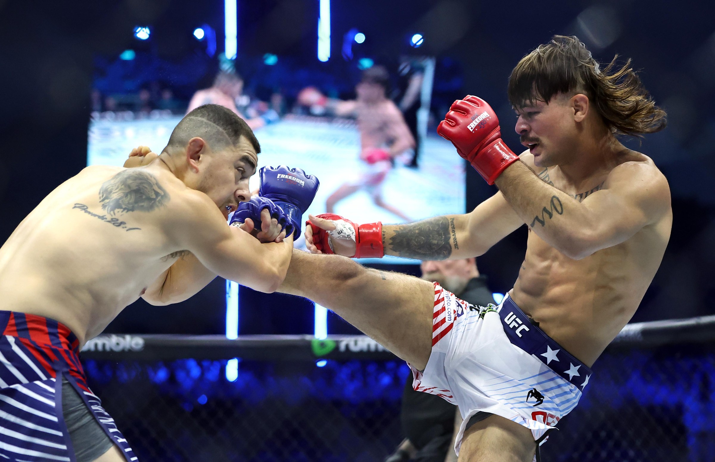 WASHINGTON, DC - JUNE 14: Diego Lopes of Brazil (R) lands a kick against Steve Garcia of the United States during UFC Freedom 250 at the White House on June 14, 2026 in Washington, DC. (Photo by Chris Graythen/Getty Images)