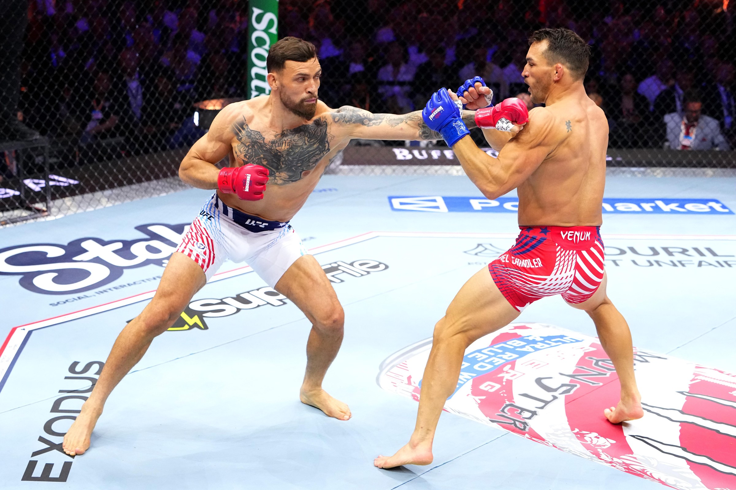 WASHINGTON, DC – JUNE 14: (L-R) Mauricio Ruffy of Brazil strikes Michael Chandler in a lightweight fight during the UFC Freedom 250 event on the South Lawn at the White House on June 14, 2026 in Washington, DC.