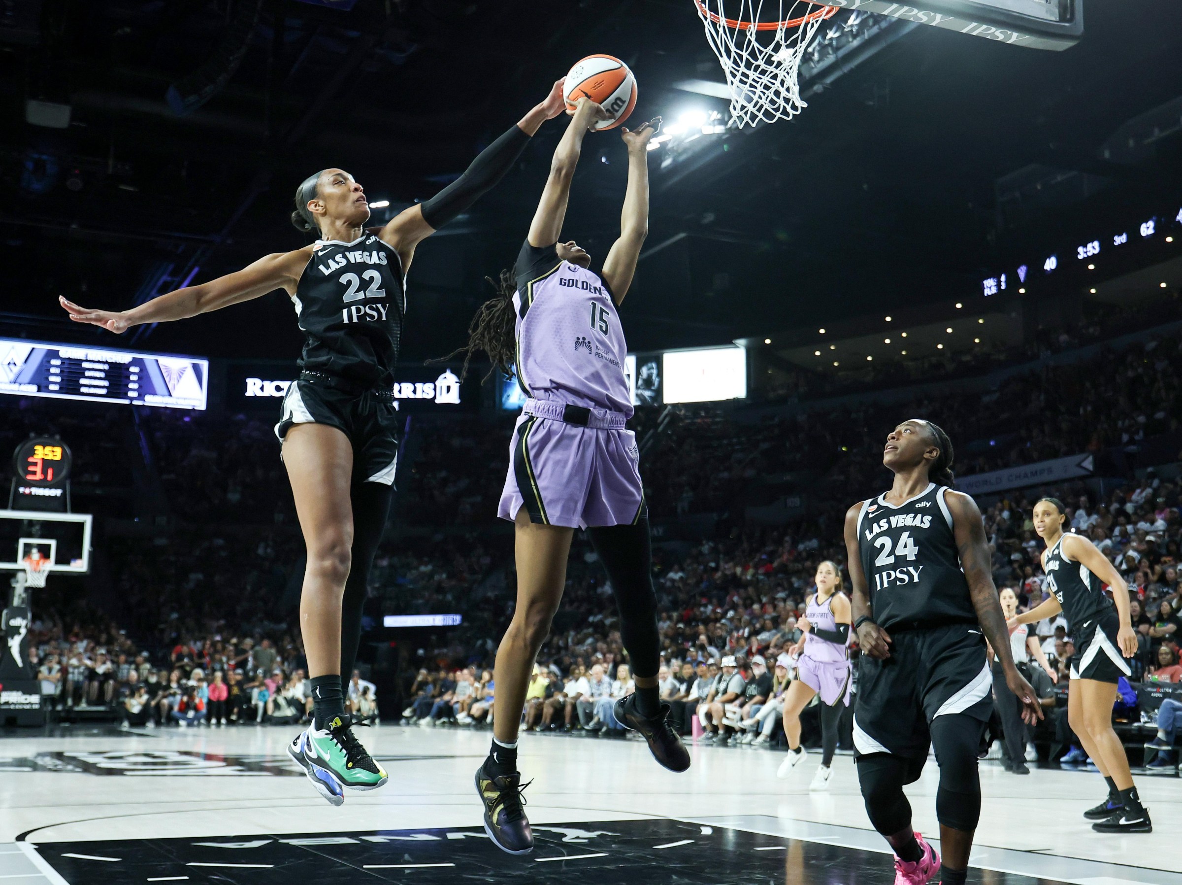 A’ja Wilson blocks Tiffany Hayes.