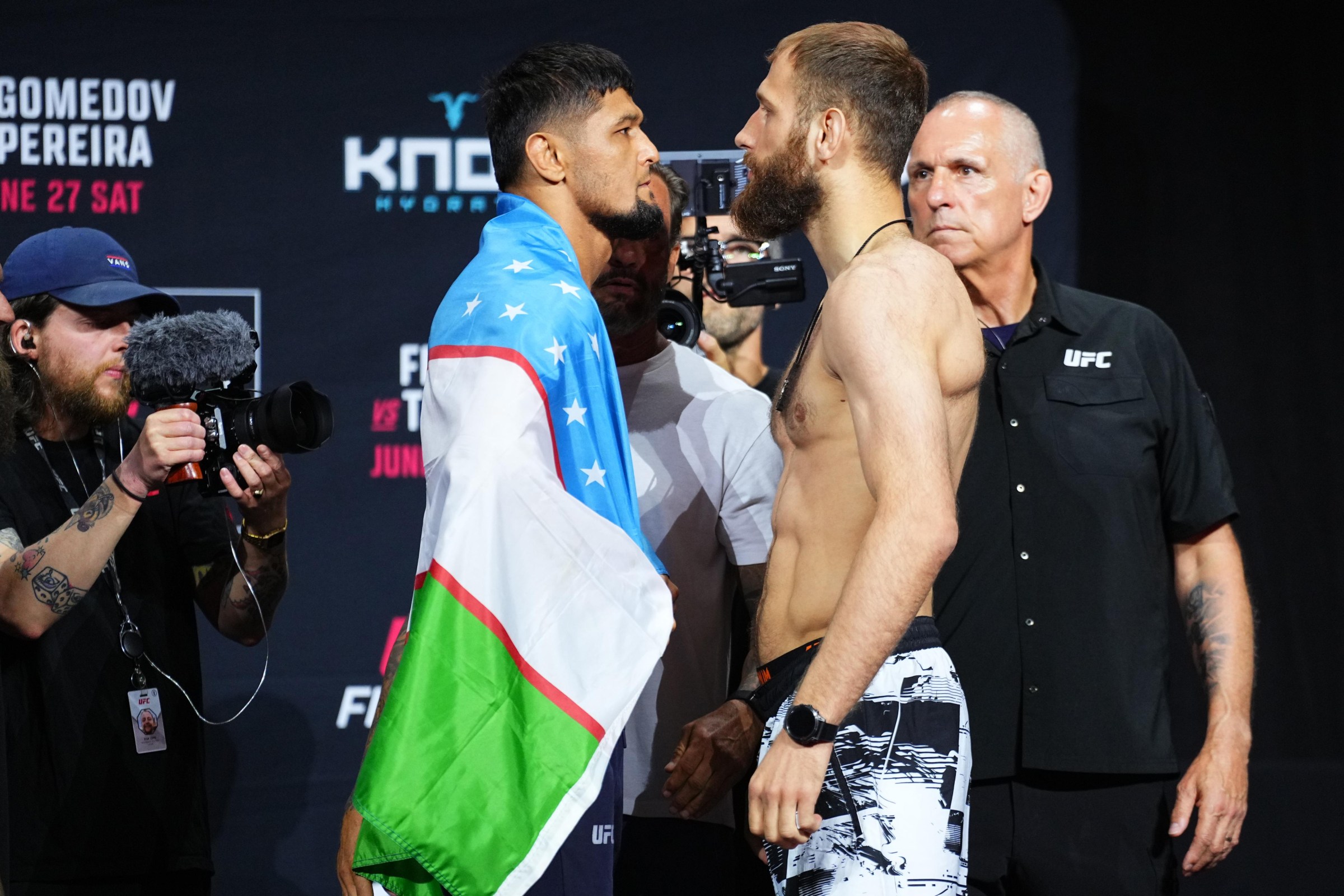 BAKU, AZERBAIJAN - JUNE 26: (L-R) Opponents Nursulton Ruziboev of Uzbekistan and Andrey Pulyaev of Russia face off during the UFC Fight Night ceremonial weigh-in at National Gymnastics Arena on June 26, 2026 in Baku, Azerbaijan. (Photo by Jeff Bottari/Zuffa LLC)