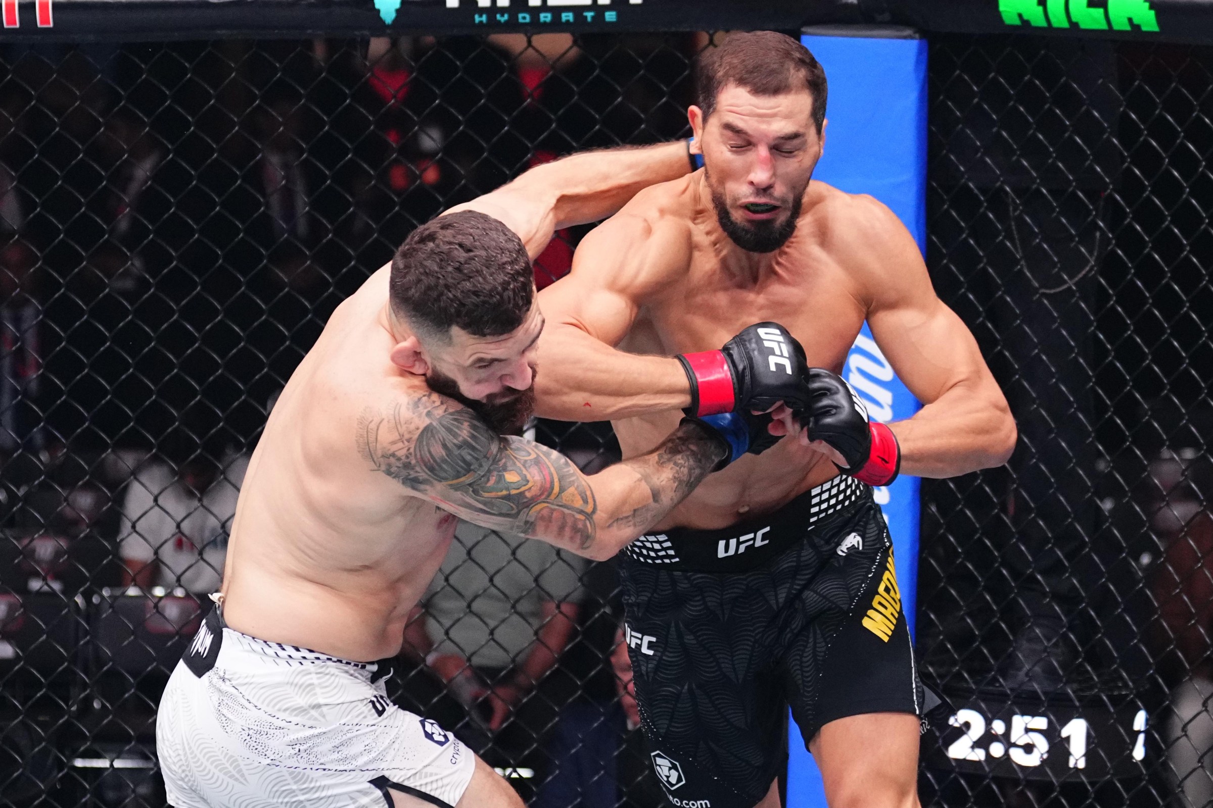 BAKU, AZERBAIJAN - JUNE 27: (R-L) Abus Magomedov of Russia elbows Michal Oleksiejczuk of Poland in a middleweight fight during the UFC Fight Night event at National Gymnastics Arena on June 27, 2026 in Baku, Azerbaijan. (Photo by Jeff Bottari/Zuffa LLC)