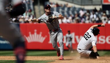 Cleveland Guardians second baseman Travis Bazzana throws to first after getting a force out on New York Yankees' Benb Rice to complete the double play on Paul Goldschmidt at first base during the sixth inning of a baseball game Thursday, June 4, 2026, in New York. (AP Photo/Adam Hunger)