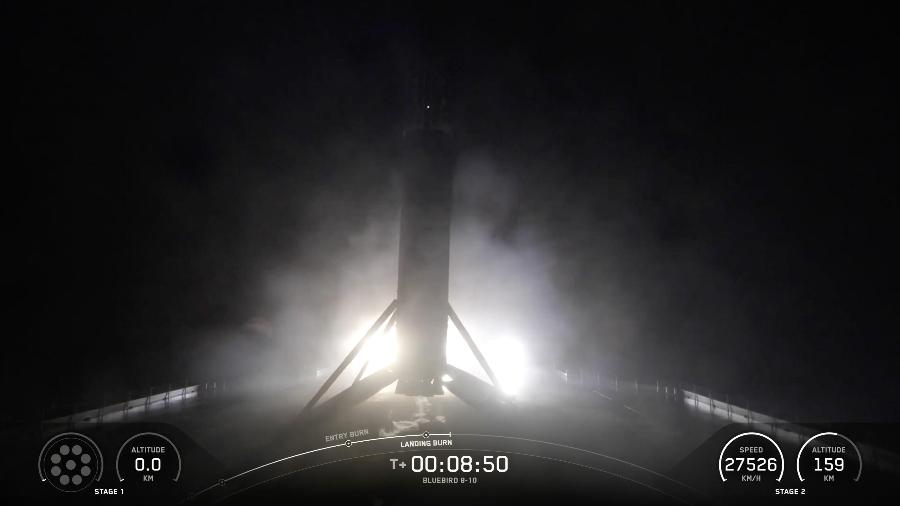 a rocket rests on the deck of a ship at sea at night