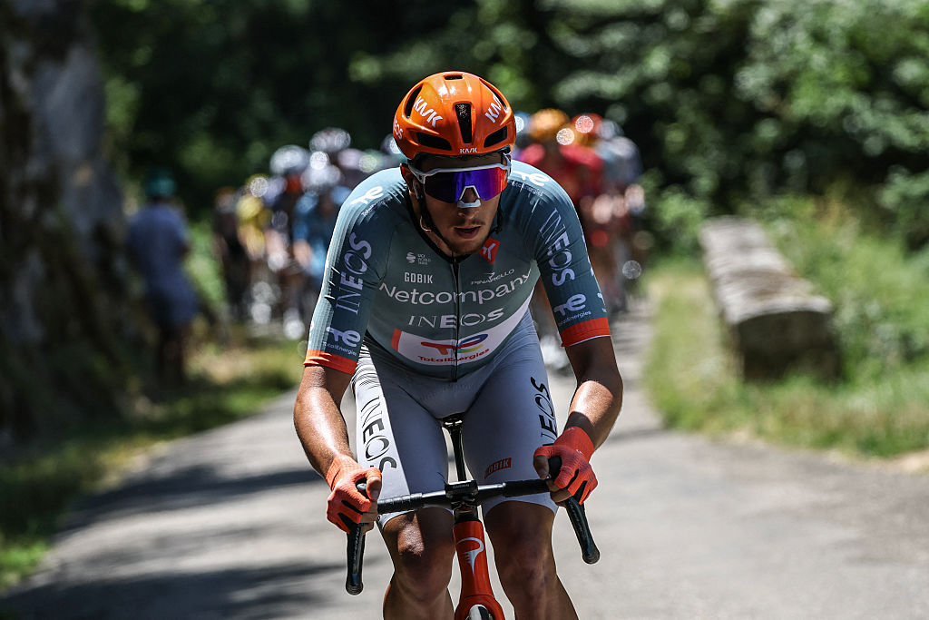 Netcompany Ineos Cycling Team's French rider K&eacute;vin Vauquelin cycles during the 7th stage of the Tour Auvergne-Rhone-Alpes cycling race (formerly known as the Criterium du Dauphine), 133,6km between La Bridoire and Grand Colombier in the French Alps on June 13, 2026. (Photo by Anne-Christine POUJOULAT / AFP)