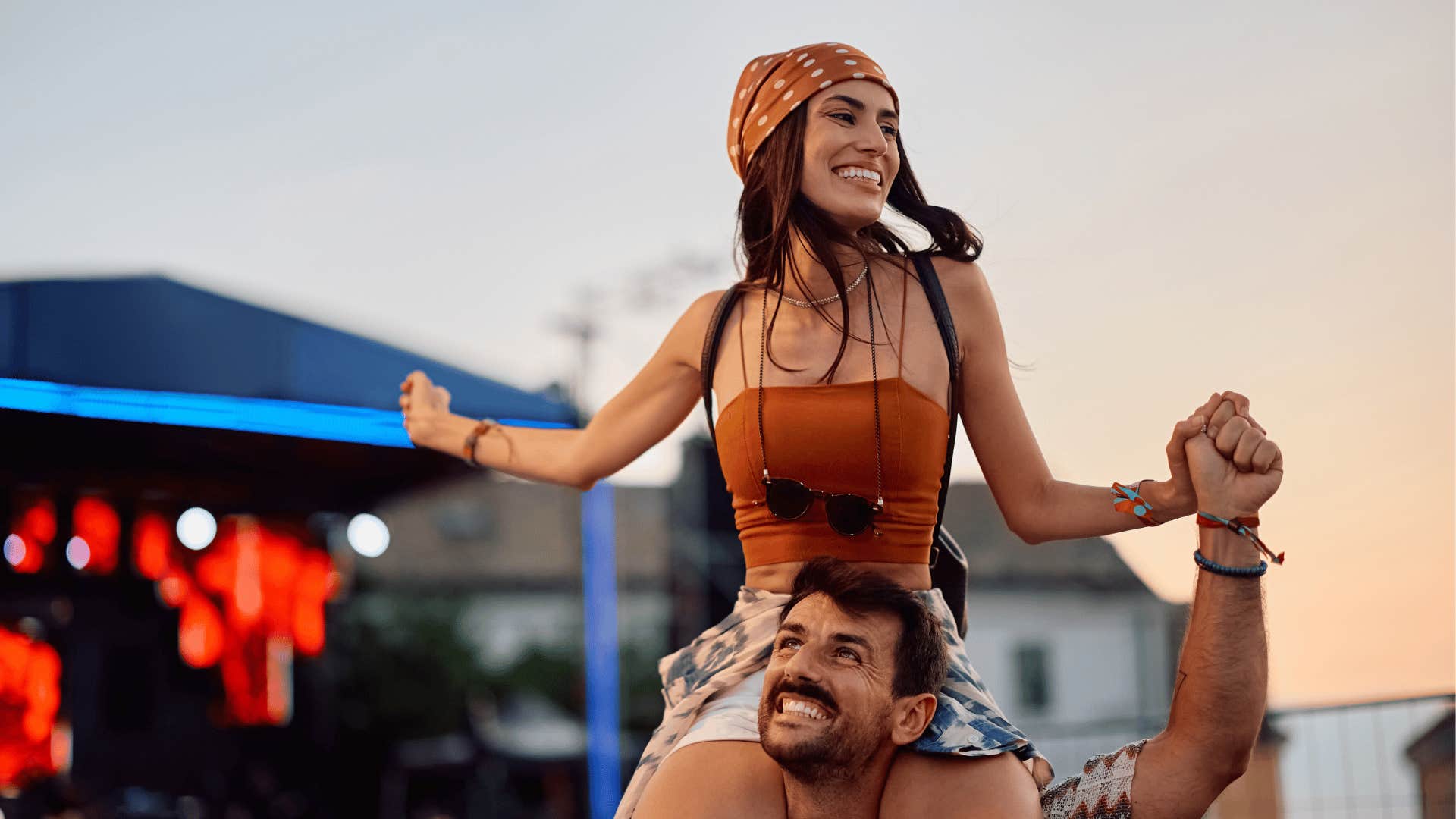 couple enjoying a concert and protecting their mental health