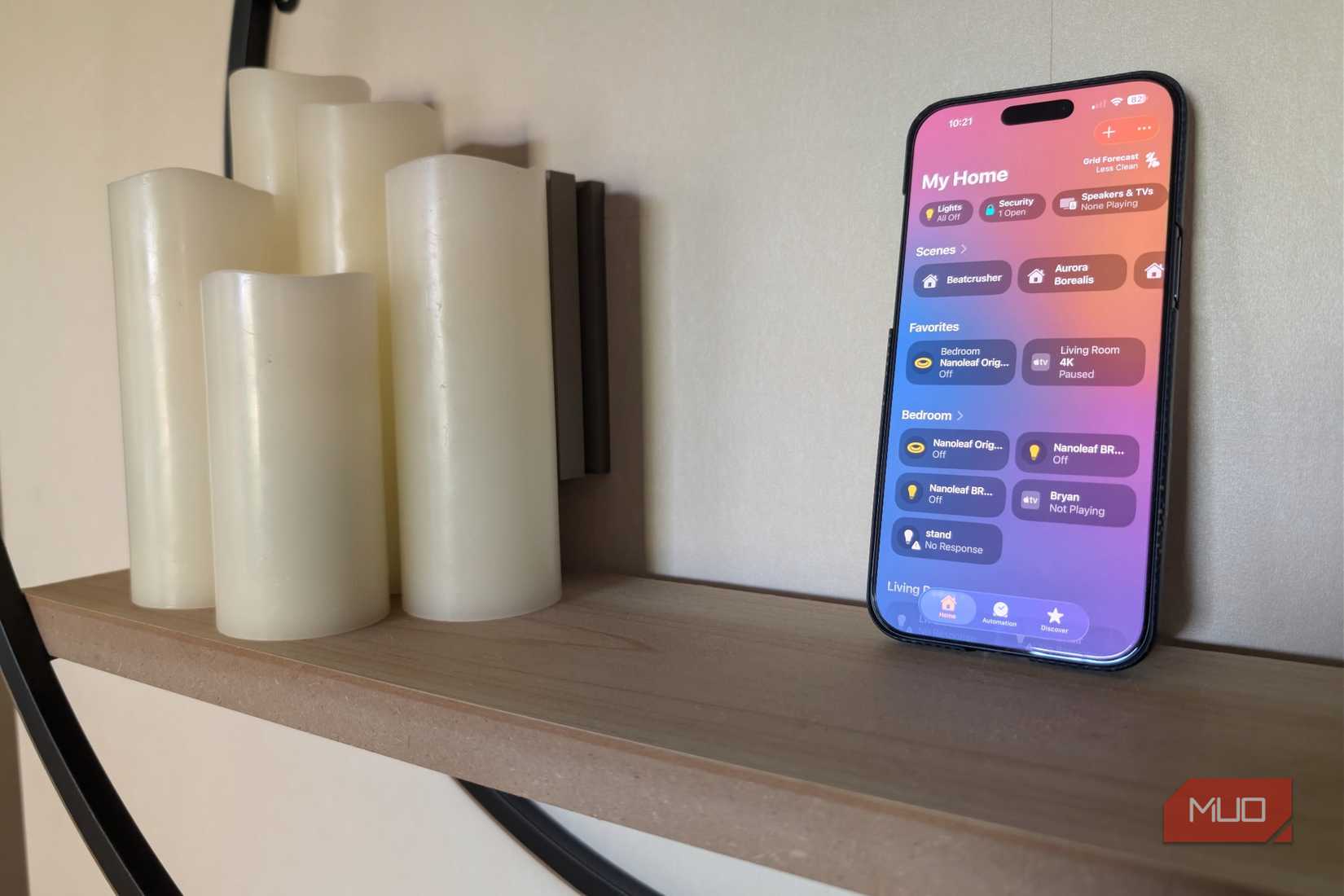 HomeKit on an iPhone on a wall.
