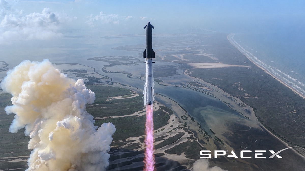 Falcon rocket launching straight up with pink exhaust plume over coastal wetlands, SpaceX logo bottom right.