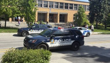 Police cars outside an elementary school.