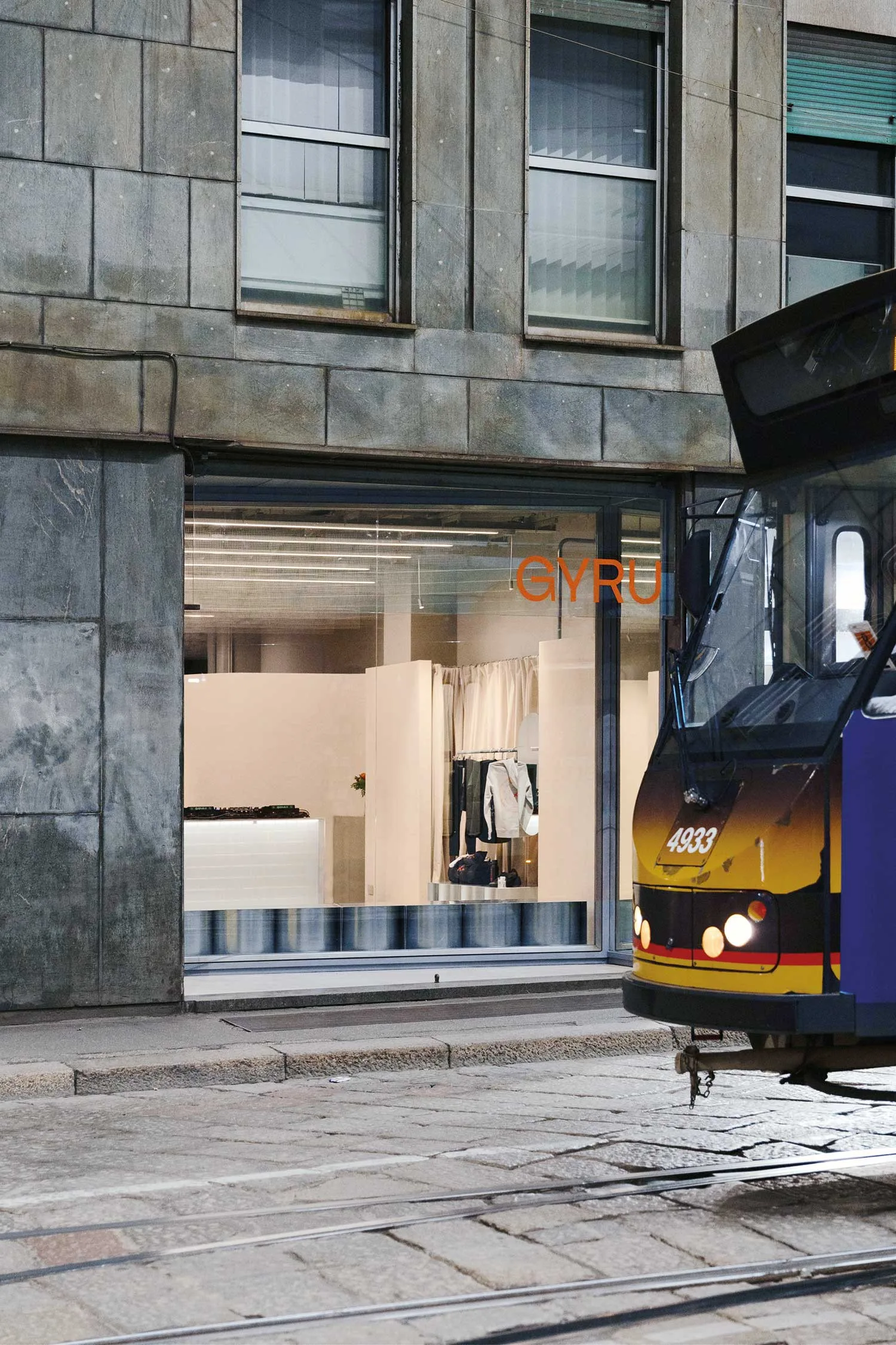 GYRU studio entrance appears as a sleek showroom from the street.