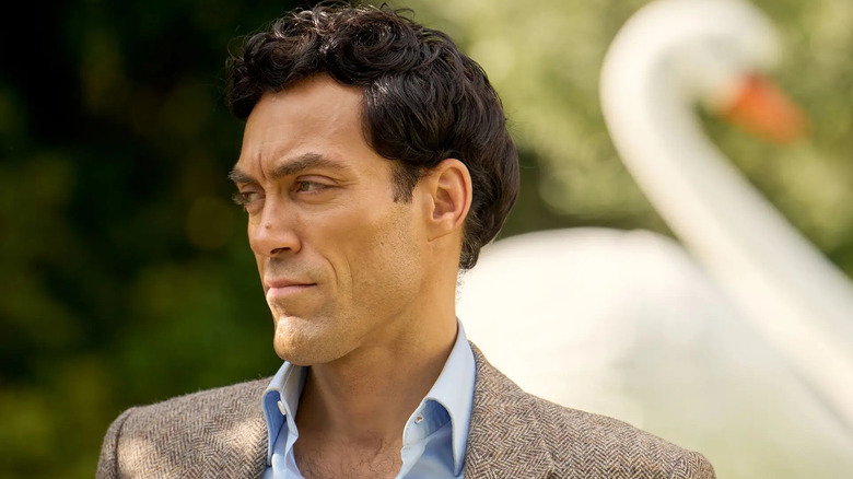 Rupert Campbell-Black (Alex Hassell) glances to his right outside in Rivals