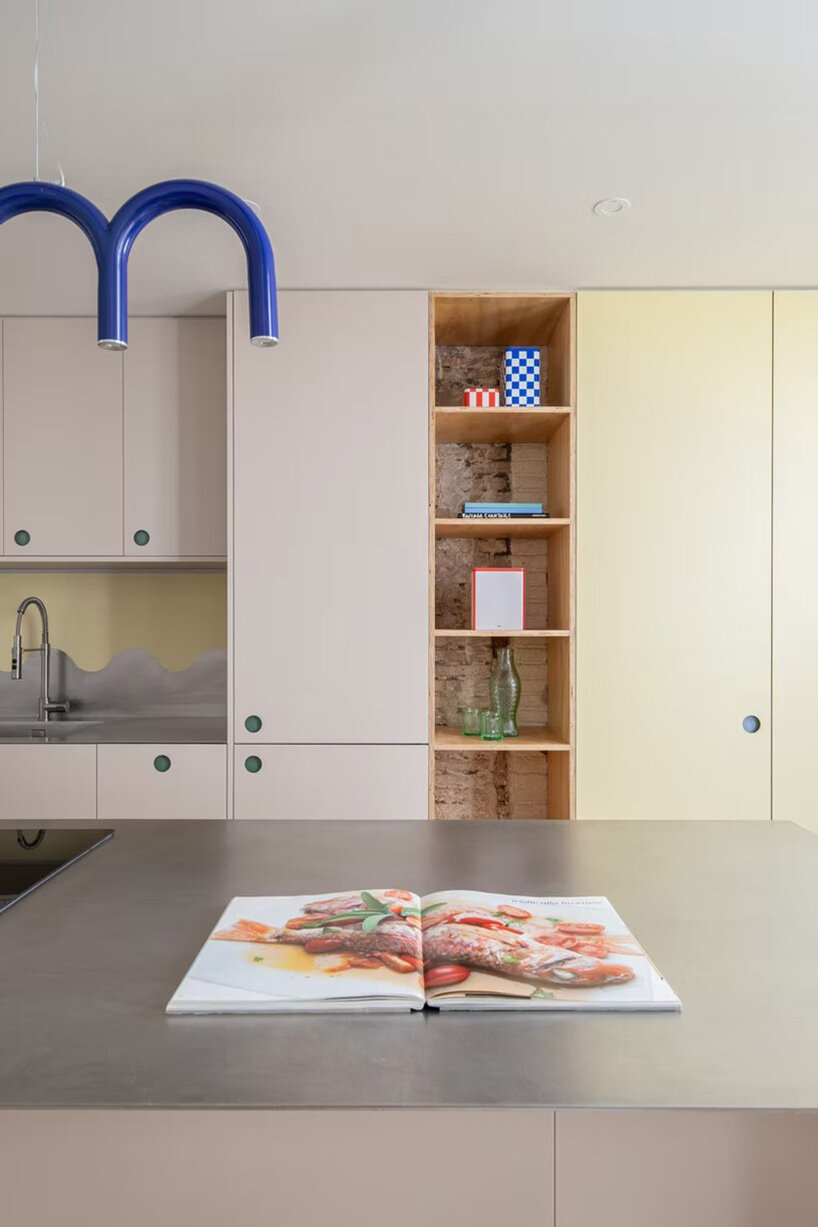 NOT A STUDIO uses color-coded structure to open up century-old barcelona apartment - 5