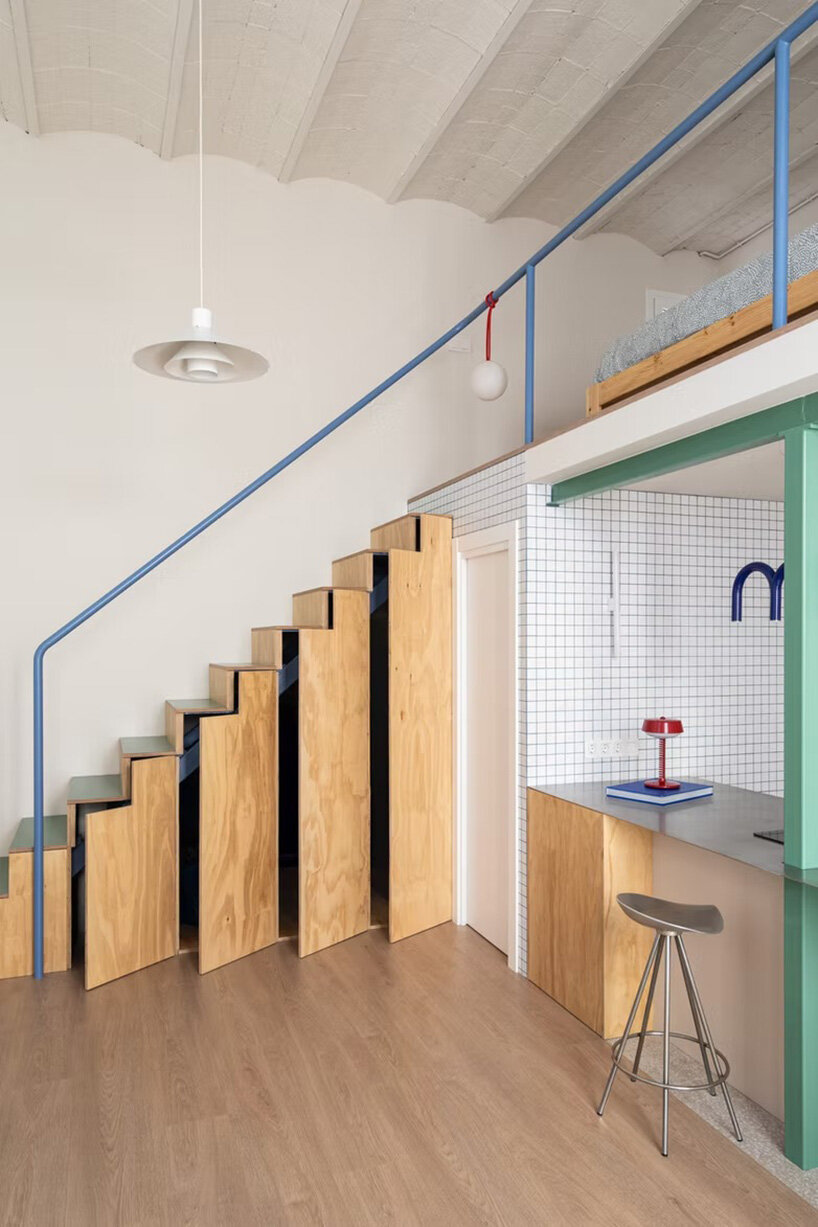 NOT A STUDIO uses color-coded structure to open up century-old barcelona apartment - 7