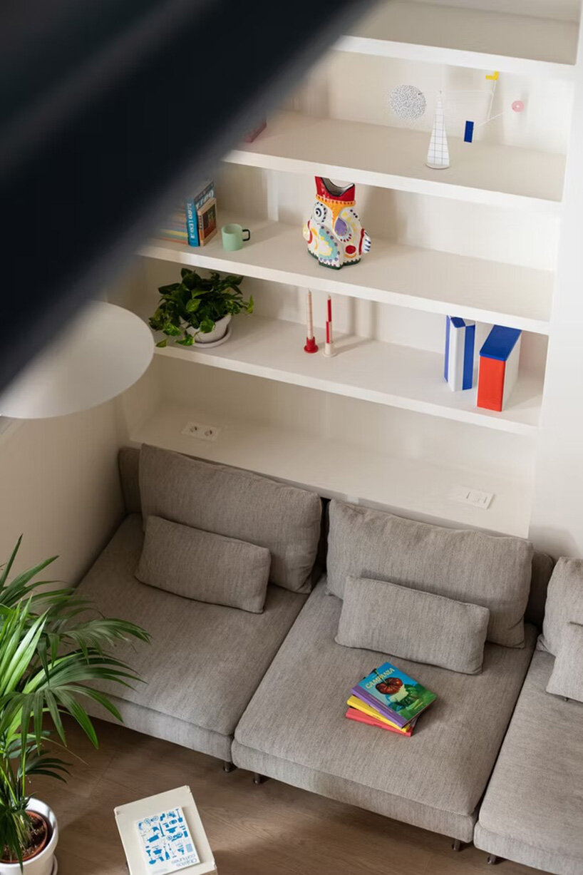 NOT A STUDIO uses color-coded structure to open up century-old barcelona apartment - 13