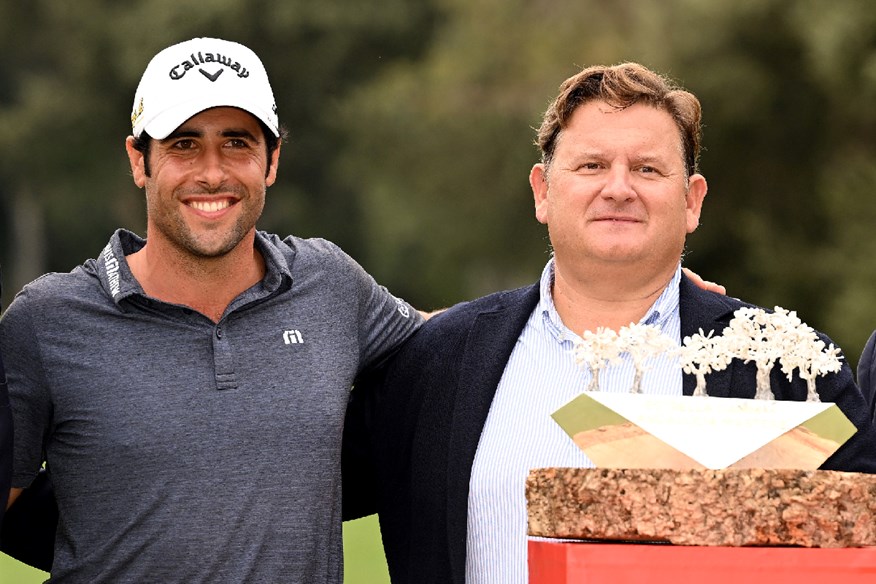 Adrian Otaegui celebrates his 2022 Andalucia Masters victory at Valderrama with the club's GM Javier Reveriego.