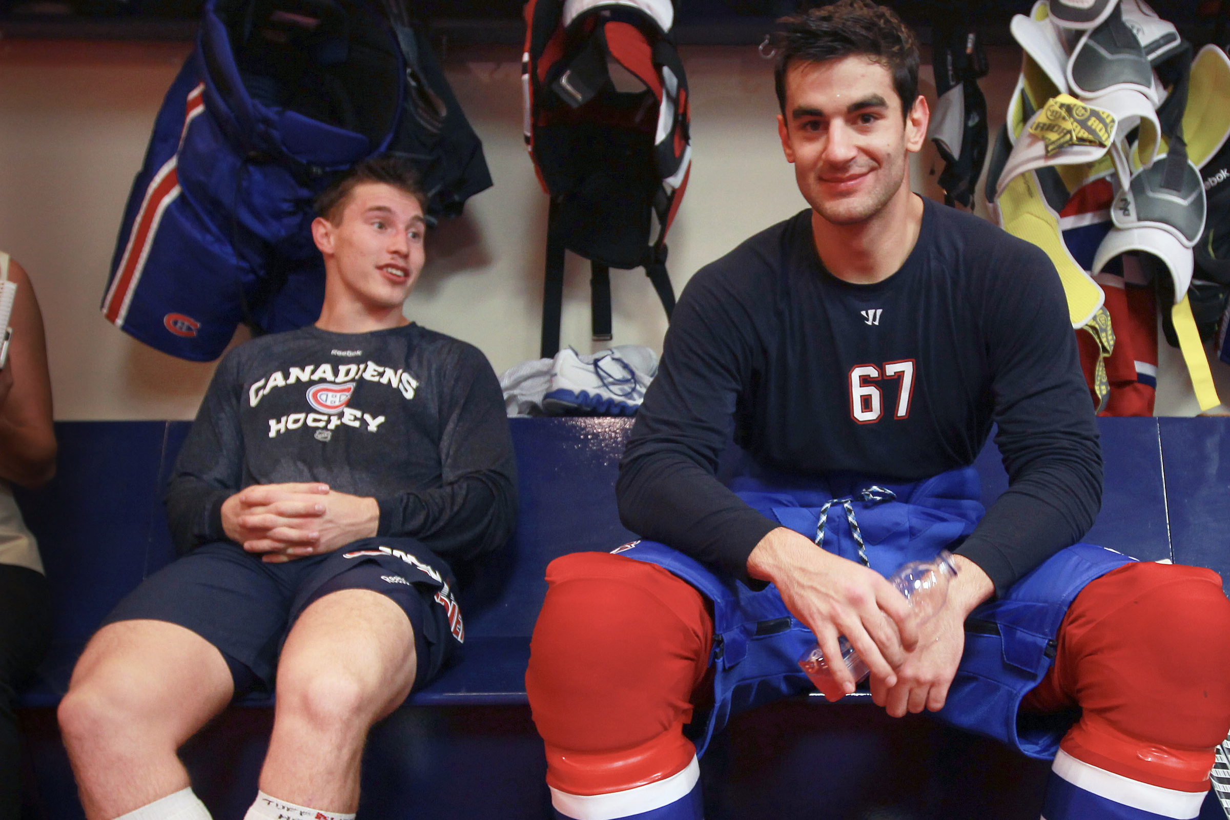 Brendan Gallagher and Max Pacioretty relax in the locker room.