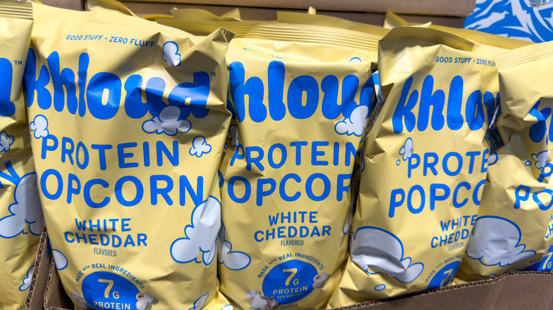 Bags of Khloud protein popcorn