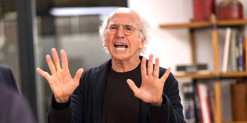 Larry David talking with his hands up in Curb Your Enthusiasm.