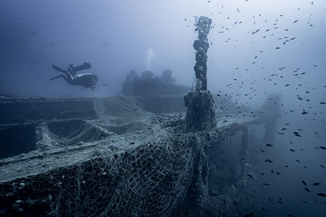A shipwreck covered in ghost nets, which can trap marine animals.