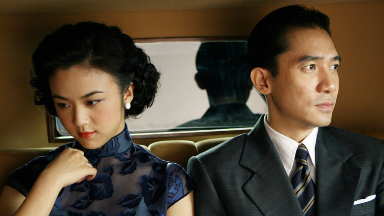 Mrs Mak and Mr Yee travelling in 