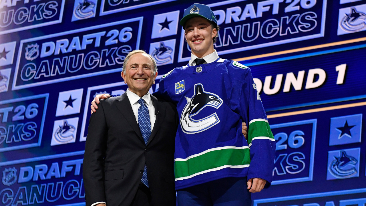 Canucks ignore convention by pairing coach Malhotra with son Caleb