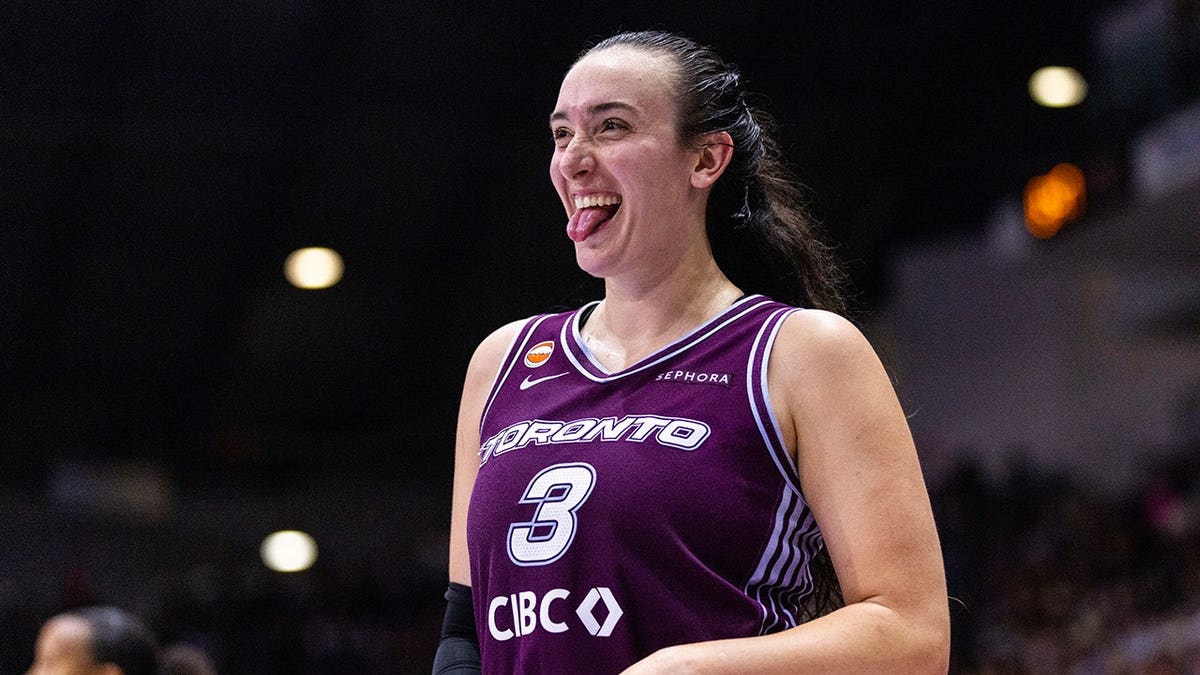 Marina Mabrey wearing Toronto Tempo uniform reacting during WNBA game at Coca-Cola Coliseum
